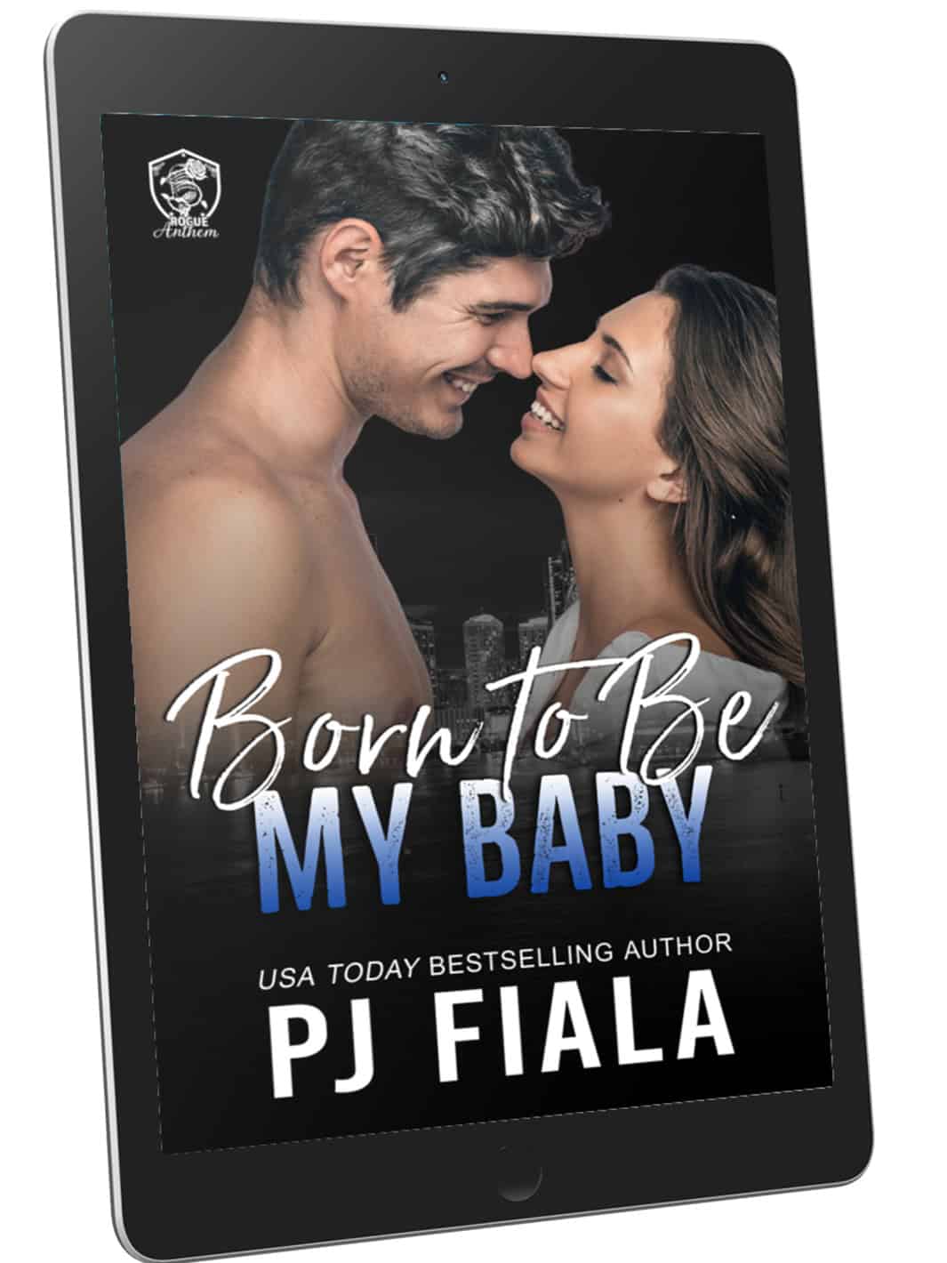 eBook cover of Born to Be My Baby by PJ Fiala displayed on a black tablet. The cover features a smiling couple leaning forehead to forehead against a nighttime city skyline, introducing a romance in the Blossom Springs: Rogue Anthem series.