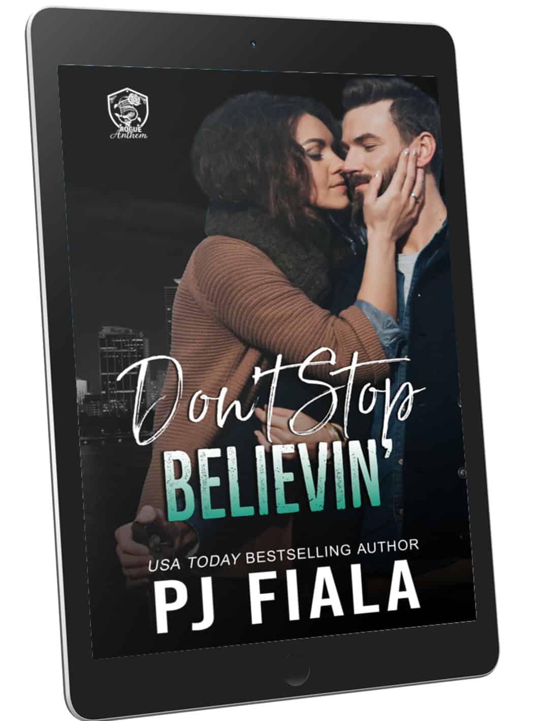 eBook cover of Don't Stop Believin' by PJ Fiala displayed on a black tablet. The cover features a couple sharing an intimate moment against a nighttime city skyline, introducing the first book in the Blossom Springs: Rogue Anthem romantic suspense series.