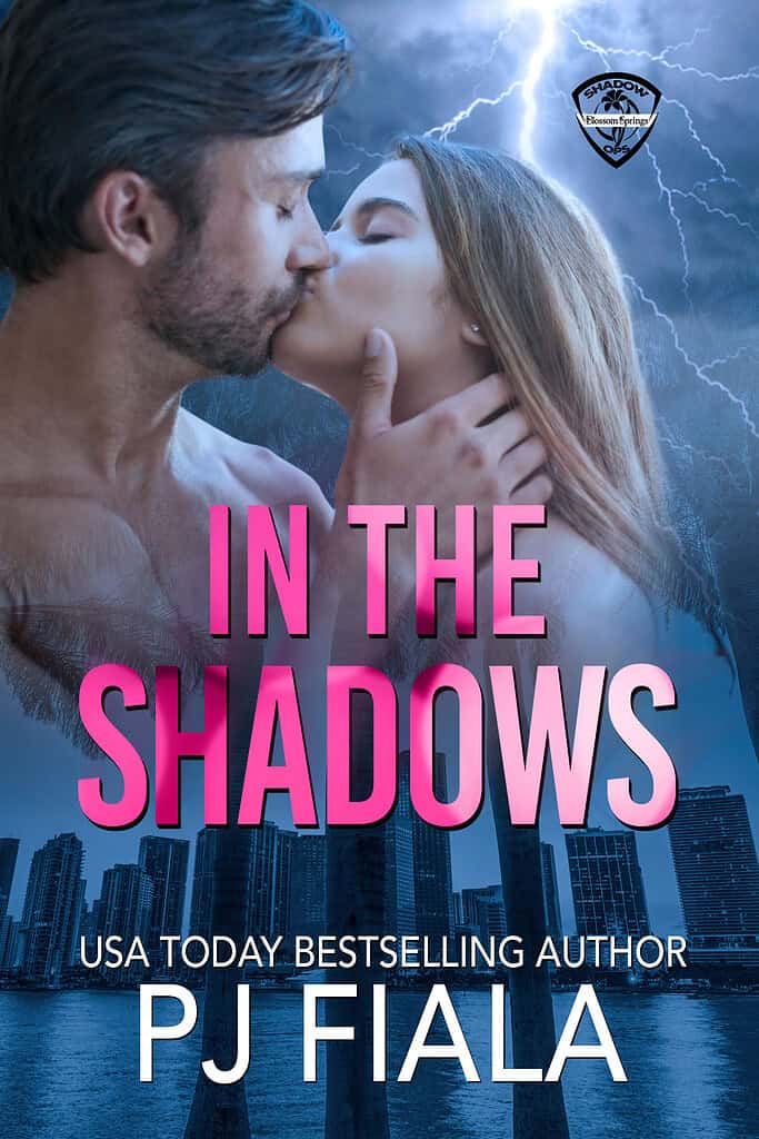 In the Shadows by PJ Fiala, romantic suspense ebook, Shadow Ops series, protective hero, intense kissing couple, city skyline